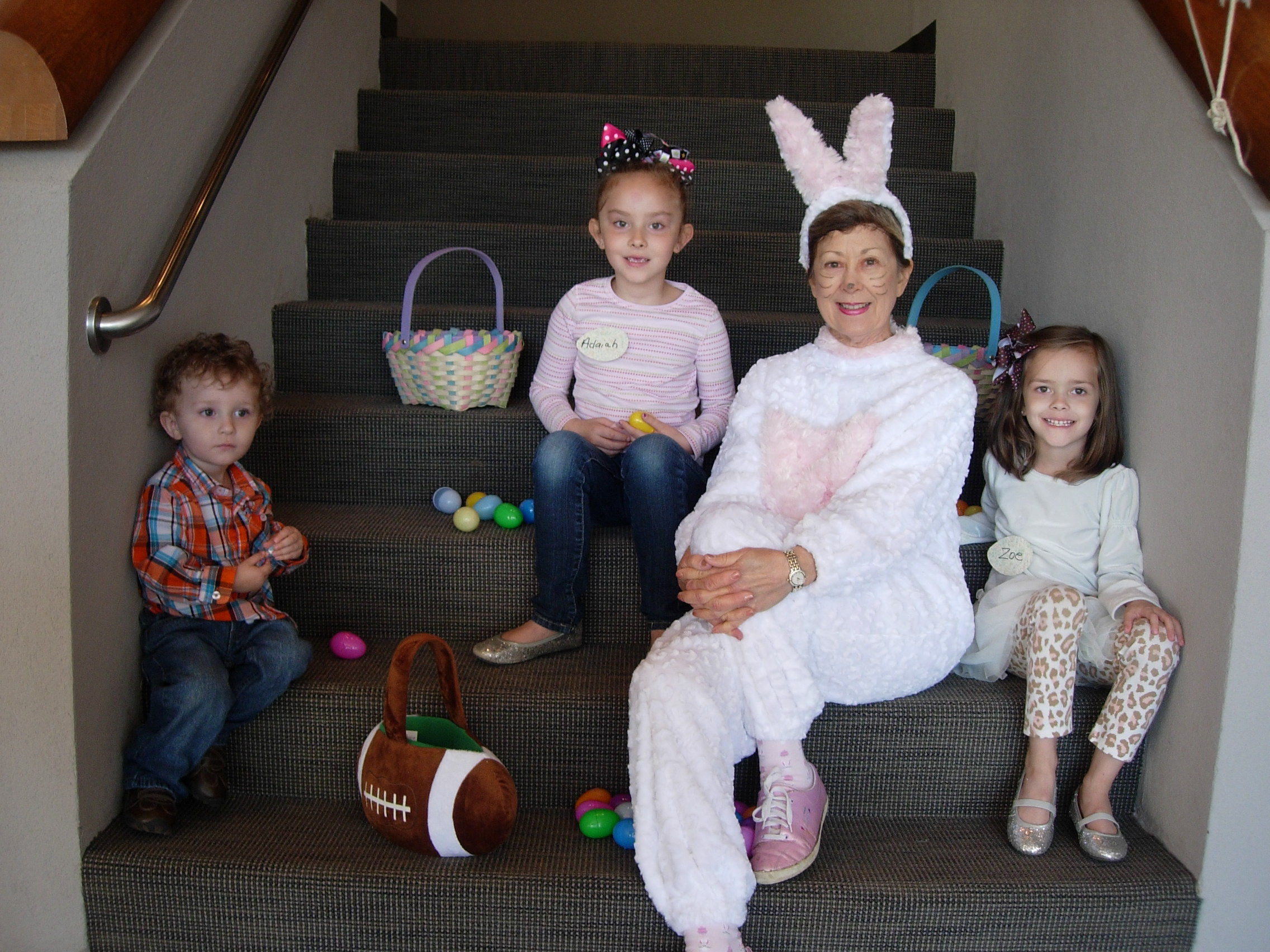 Easter Bunny Sandy Pickett and her little friends at the Easter egg hunt