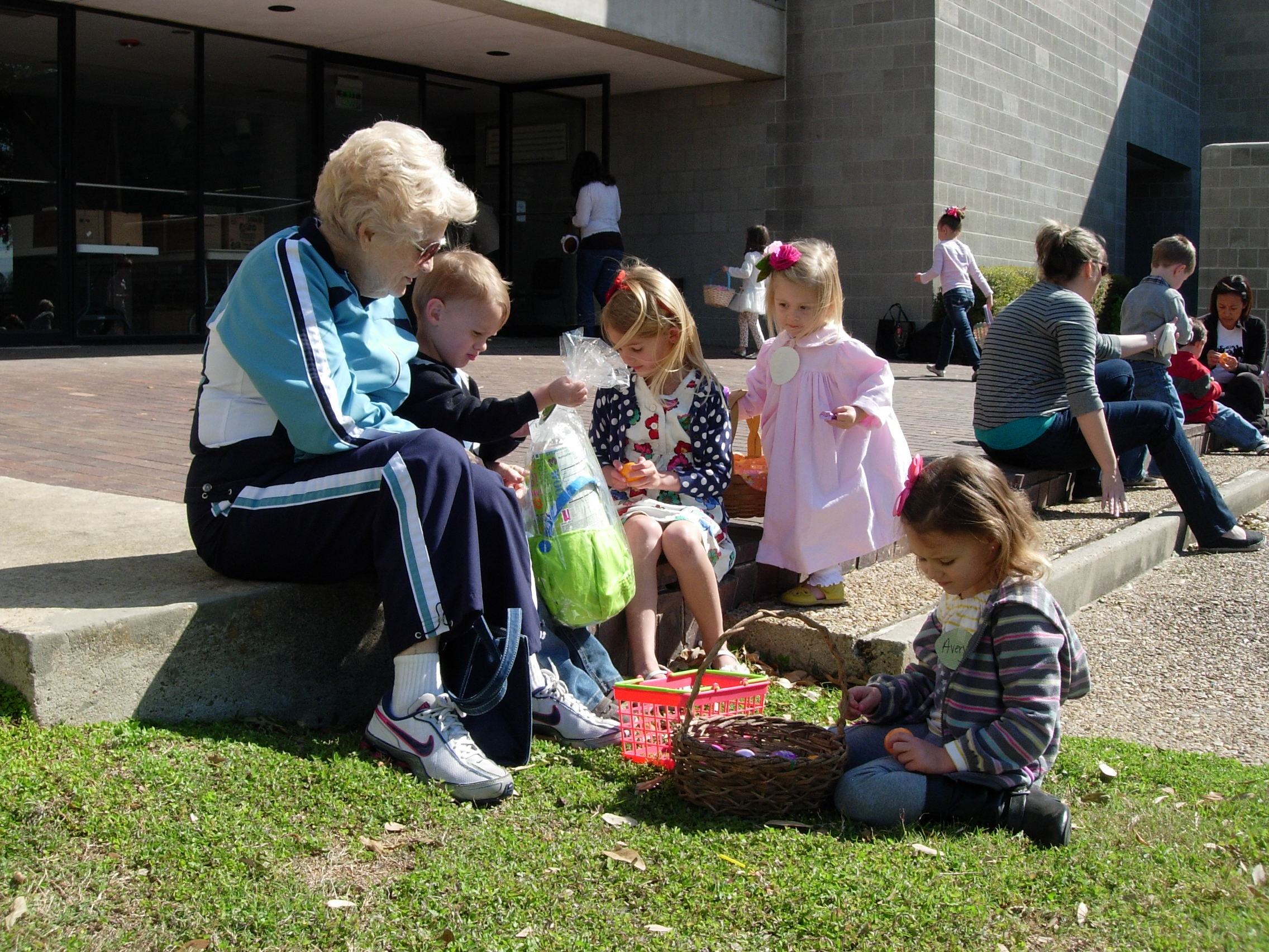 Peggy Ivy with great grandchildren at the Easter egg hunt