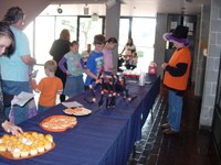 Kids grab Halloween Snacks